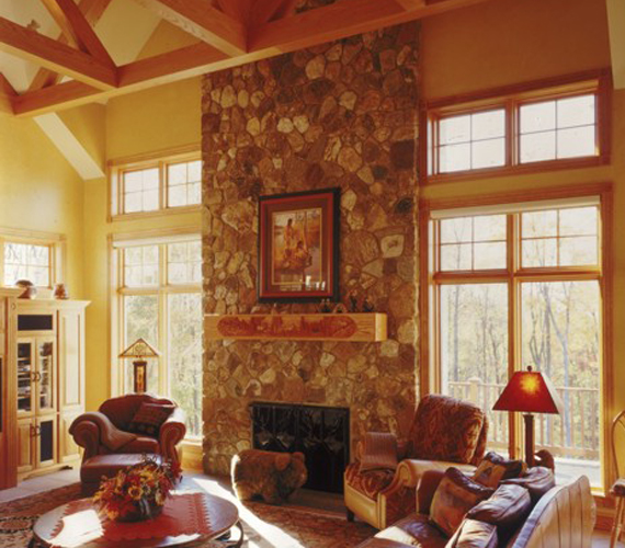 Luxurious architectural interior with stone fireplace